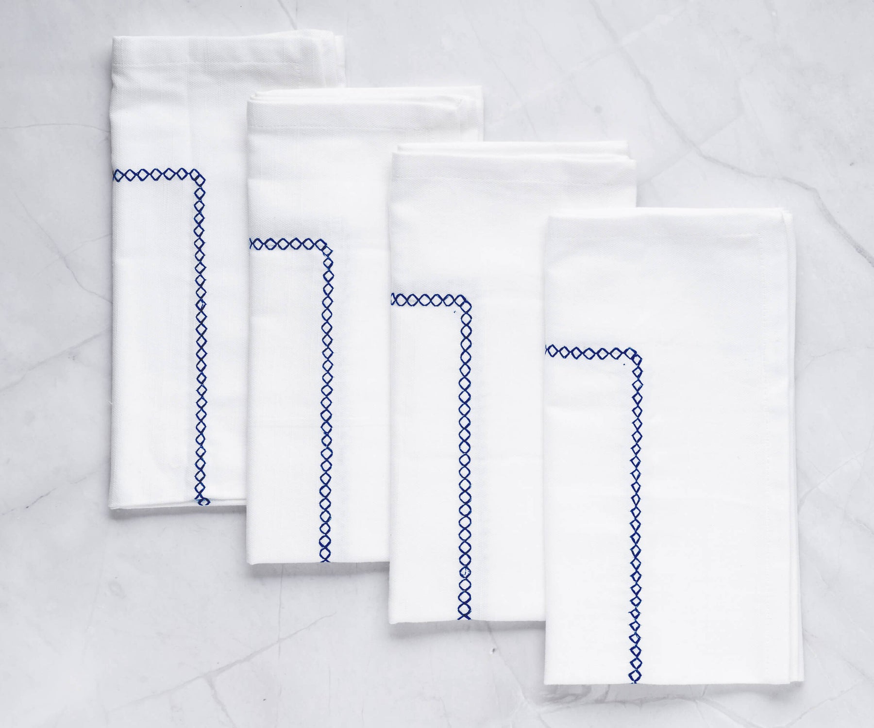 linen napkins with embroidery or dinner napkins are cotton fabric. embroidered navy napkins.