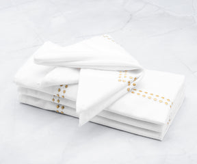 dinner napkins your table setting with folded dinner napkins and linen options of the perfect size. Add a festive touch with Christmas dinner napkins or make a statement at weddings with elegant choices.A Golden Napkin Folded into a Flower Pattern for Fine DiningSoft Cloth Napkins with Gold Accents for a Rustic Table Setting