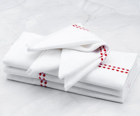 Organize your dinner napkins with a convenient holder and explore various elegant folds. Stock up on bulk cloth dinner napkins for practicality and discover the best options available.
