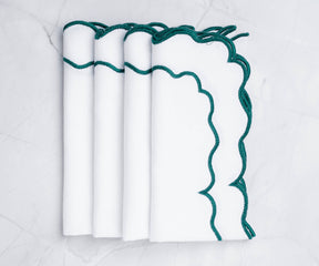 elegant napkin folding, scalloped napkins.