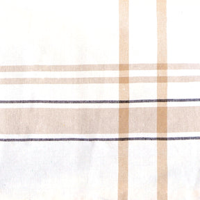 Rectangle tablecloth in white and tan plaid with a black and white stripe