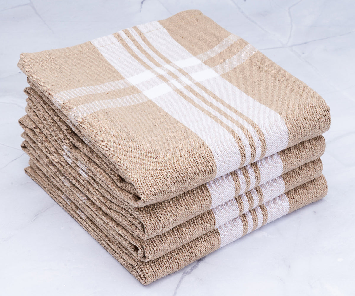 Beige and white striped farmhouse kitchen towels in a stack
