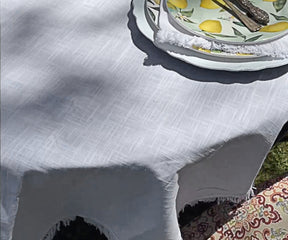 A round tablecloth brings a touch of elegance and style to any dining arrangement. Its curved edges soften the look of the table and create a sense of unity among guests. 