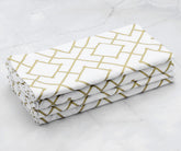 Folded set of 4 Cotton napkins - gold dinner napkins  are arranged one above another.(cloth dinner napkins)