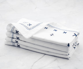 White cloth napkins - If sustainability is important to you, consider choosing cotton napkins made from organic or sustainably sourced cotton.