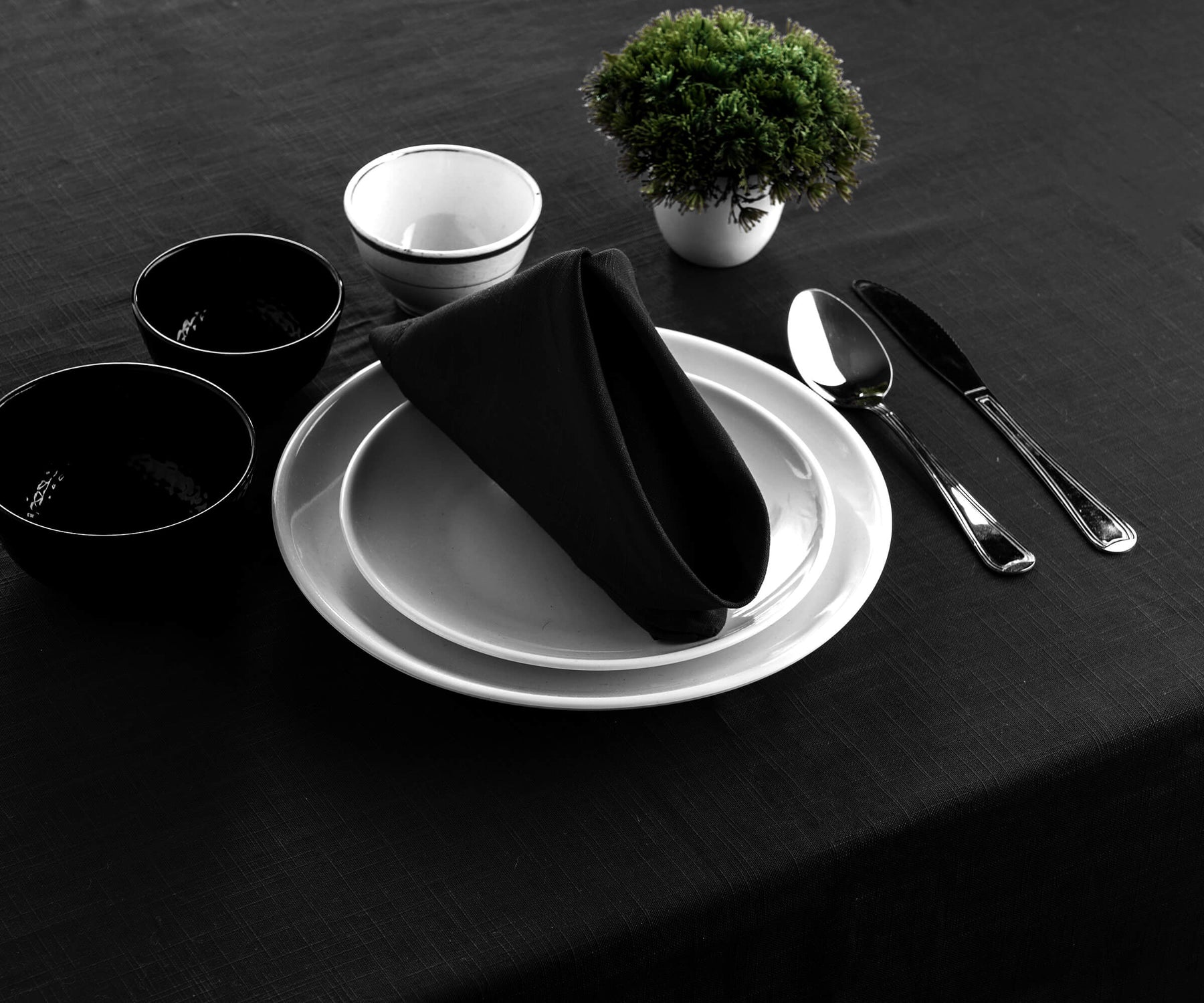 "Discover elegance in black, feel spring's essence, and celebrate holidays with our curated tablecloth selection."