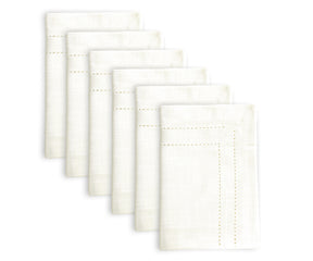 Set of four white double hemstitch cloth napkins with gold accents