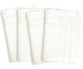 Six white double hemstitch cloth napkins adorned with gold dots