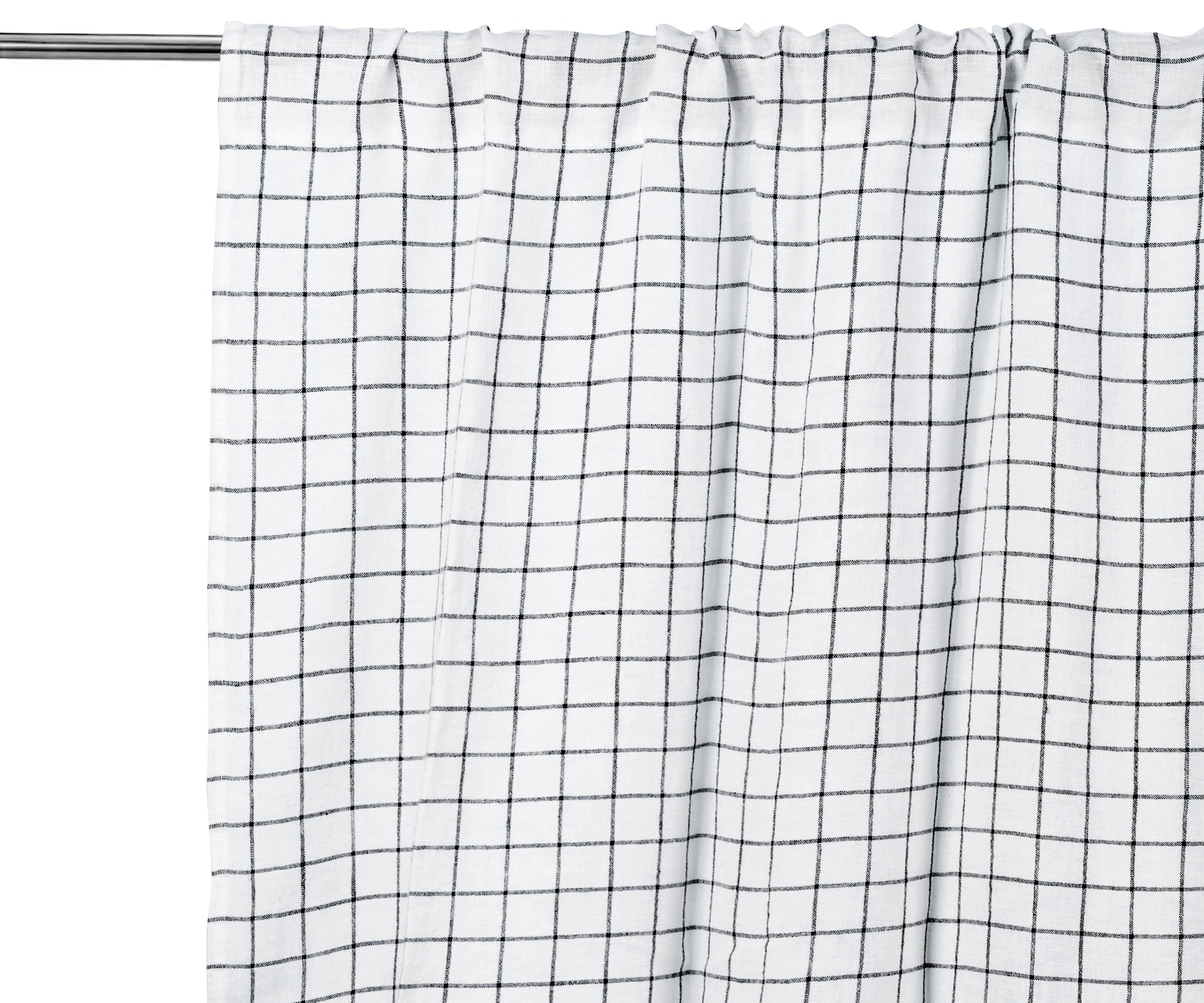Black grid linen curtain panel, light-filtering, styled in a modern living room
