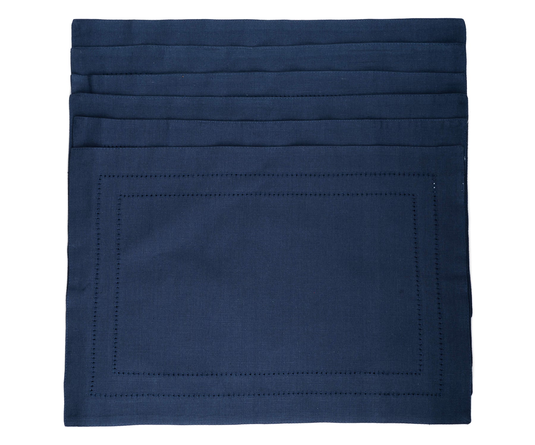 The rectangular placemats of size 13×18",a set of 6 hem stitched navy blue table placemats are arranged one above another.