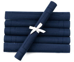 Enhance your dining setup with blue pattern placemats, boasting a trendy buffalo plaid design for a chic and practical table enhancement.
