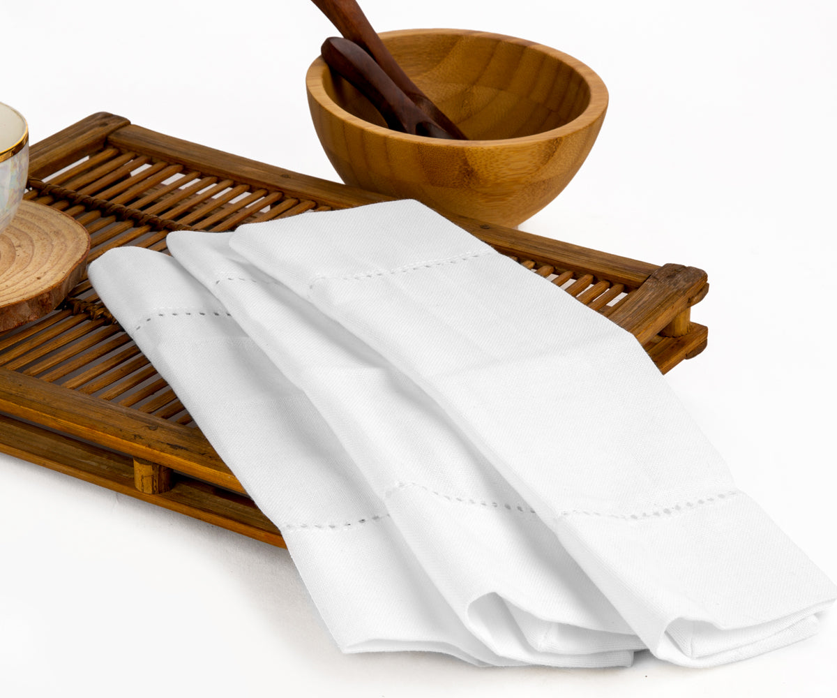 https://www.allcottonandlinen.com/cdn/shop/products/Organic-Reusable-cotton-white-napkins-set-of-6-9_1200x.jpg?v=1675747918