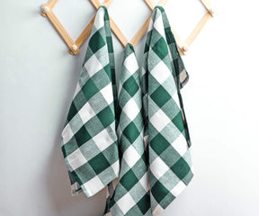A set of green dish towels is a great way to add a touch of freshness and style to your kitchen.