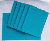 Elevate your table decor with stylish blue pattern placemats, showcasing a trendy buffalo plaid design for a chic and practical dining upgrade
