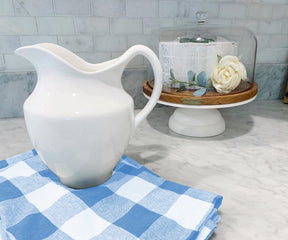 These blue waffle weave kitchen towels are a versatile and absorbent choice for drying dishes, wiping counters, or cleaning up spills.