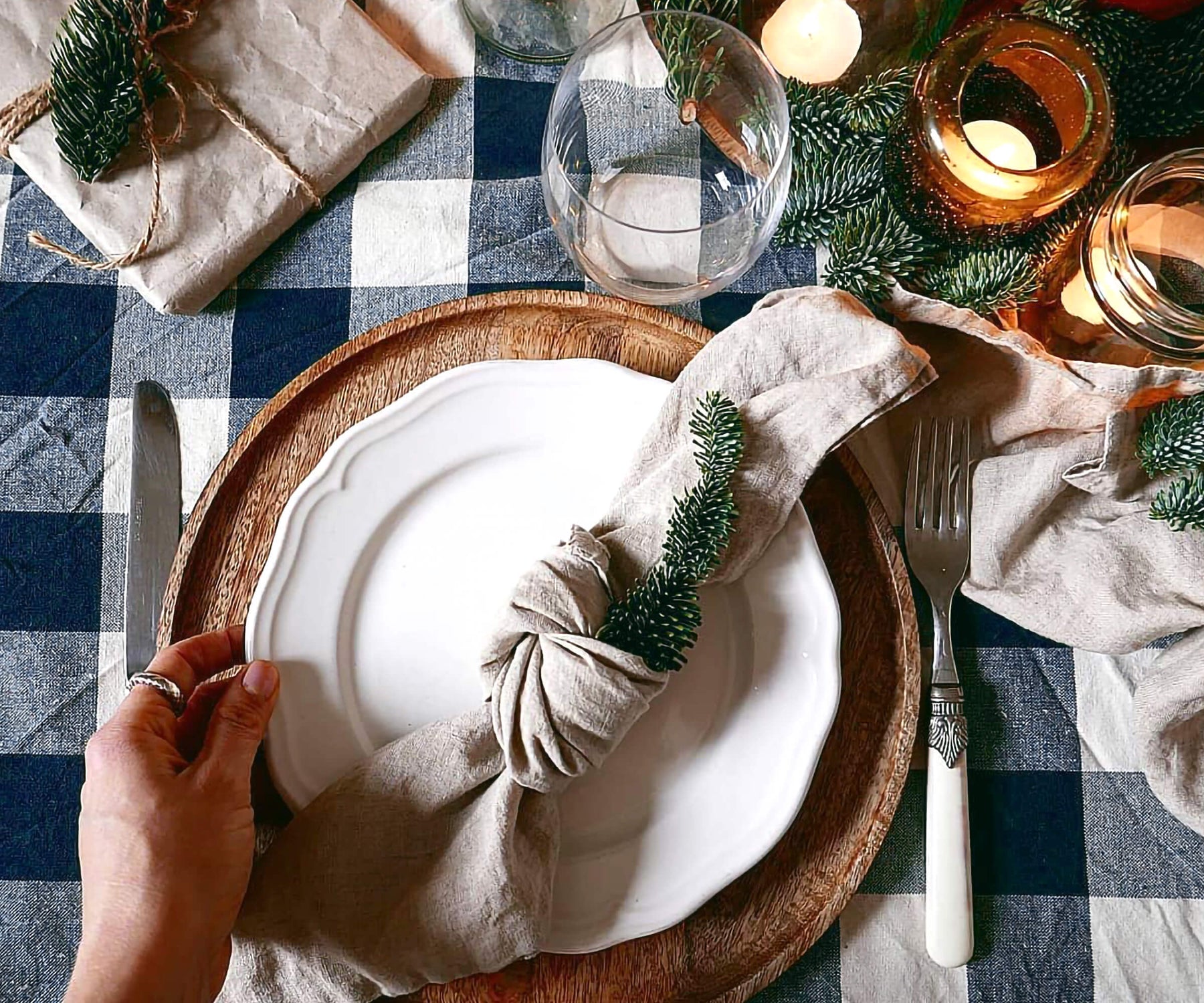 A navy blue tablecloth can complement a wide range of color palettes, making it a versatile choice for various decorative styles.