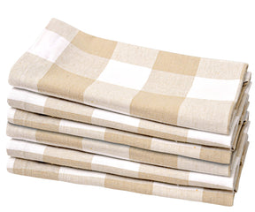 Add a touch of warmth with beige napkins, enhancing your table setup with subtle elegance.