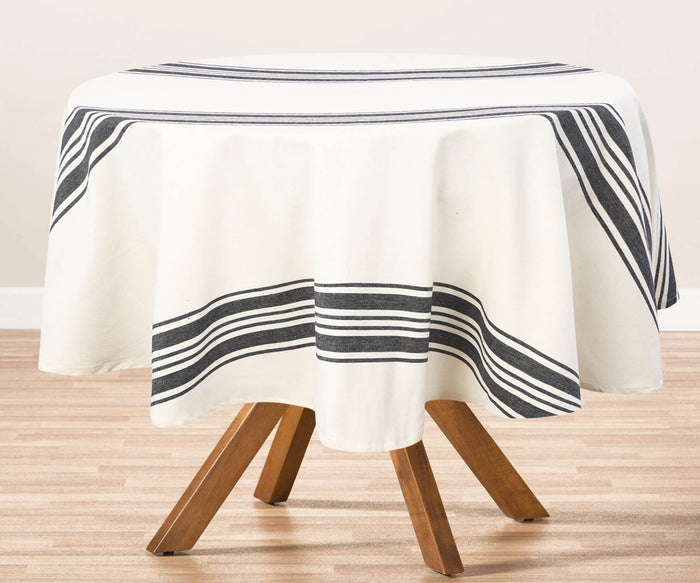 A navy round tablecloth adds elegance and style to any dining experience, whether indoors or outdoors.