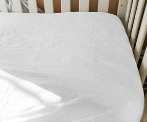 Explore our collection of fitted crib sheets designed for comfort and style in baby's room.
