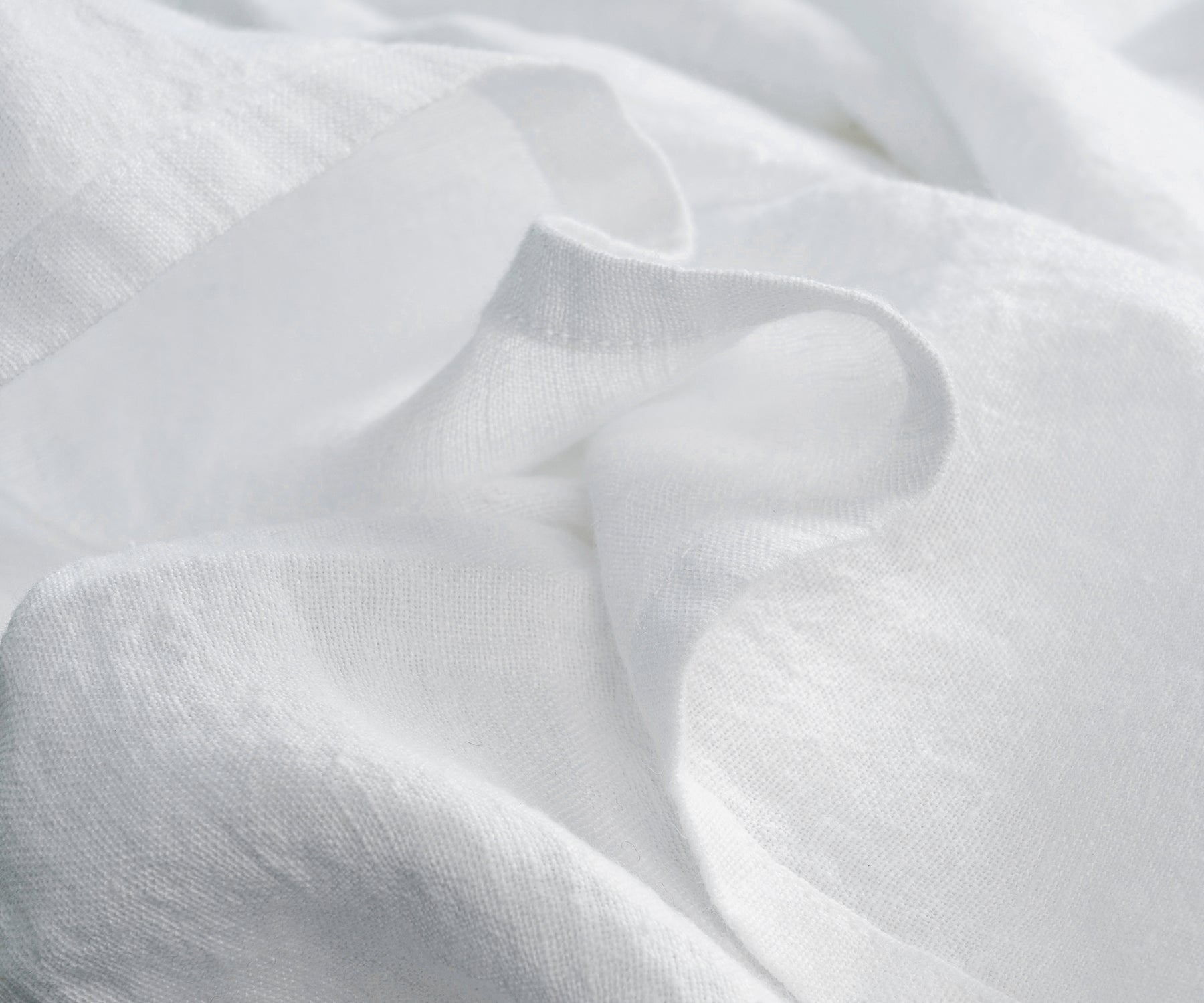Crisp white curtains bringing a refreshing vibe