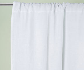 White 100% linen curtains with subtle stripe detail, styled in a bright living room