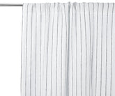 White 100% linen curtains with subtle stripe detail, styled in a bright living room
