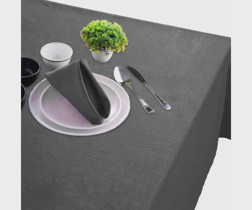 Rectangular tablecloth that are hemstitched gray tablecloth - Rectangle tablecloth spread on the wooden table with grey napkins