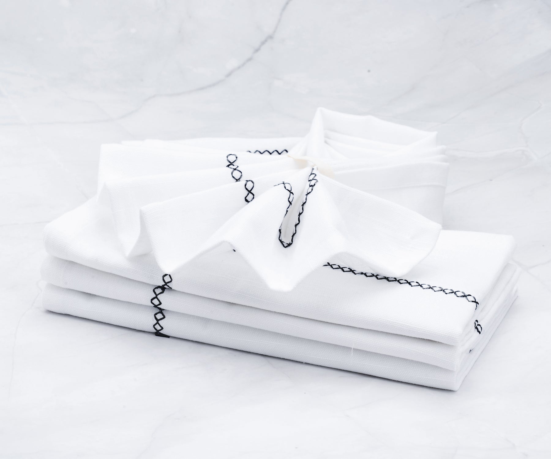 embroidery black napkins or white cotton napkins are made with woven fabric.