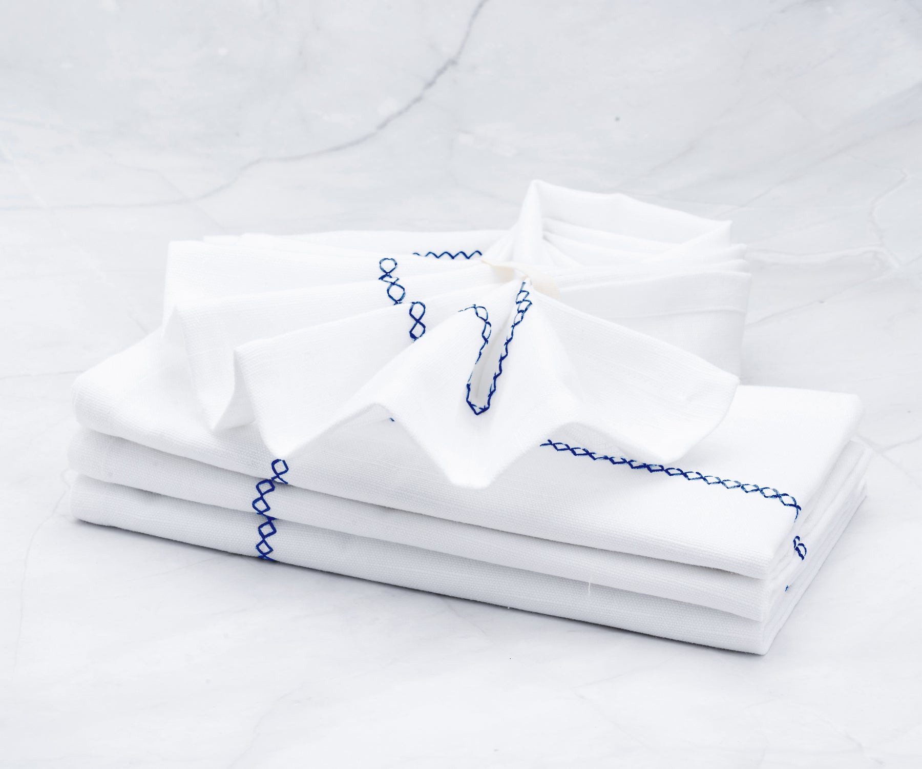 napkin easter or white cotton napkins are soft and washable & border embroidered navy napkins.