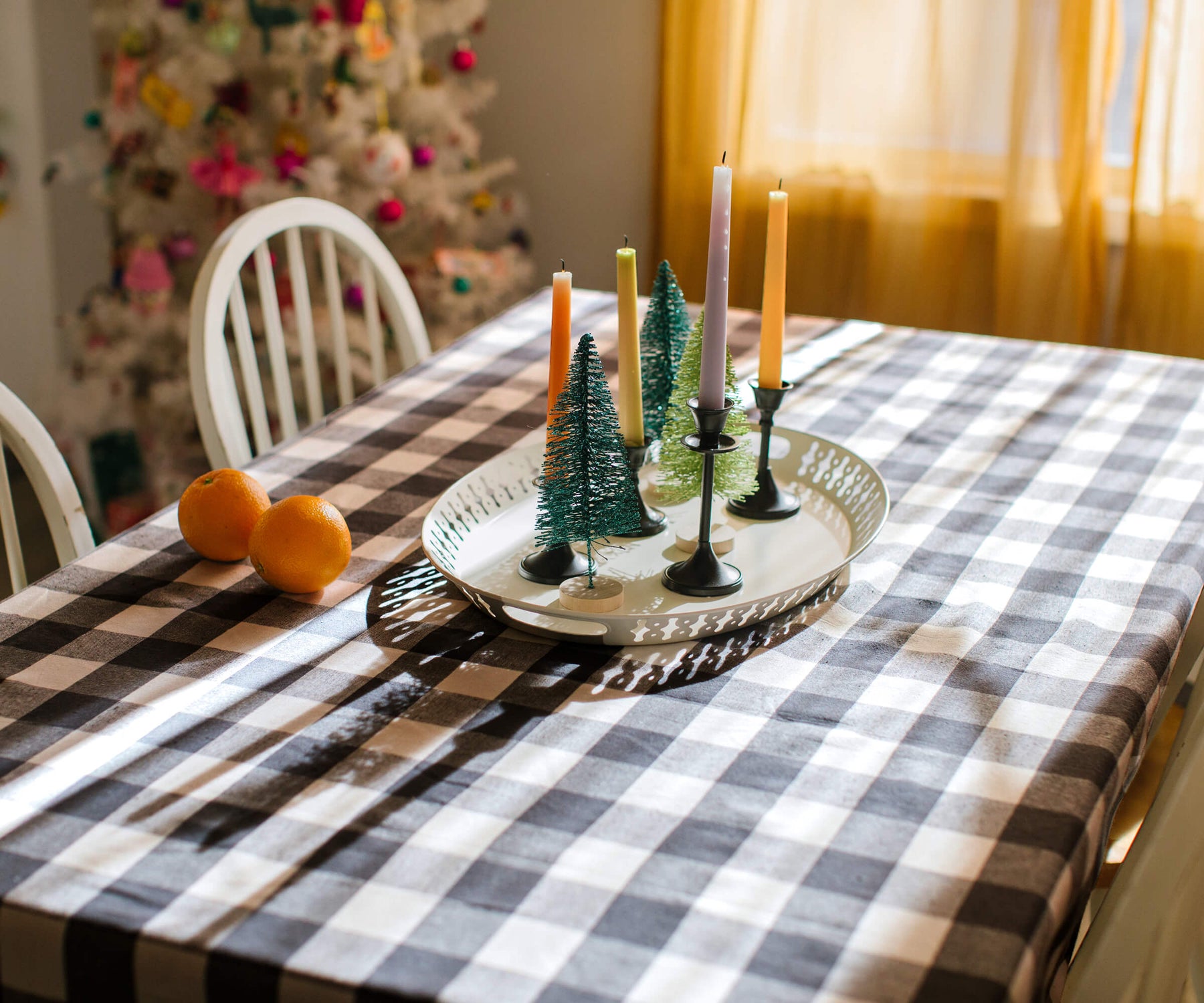 Buffalo plaid tablecloths suit holiday gatherings, like Christmas or Thanksgiving, evoking warmth and comfort.
