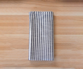 Close-up of a bistro napkin with a striped pattern