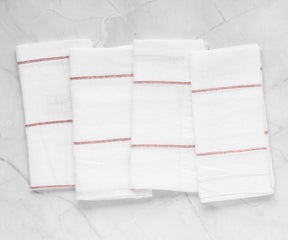 Discover cloth dinner napkins and learn how to fold them with various techniques, including cotton ones, perfect for Christmas and different dinner napkin folds.