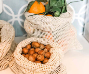 Close-up of an empty organic cotton mesh produce bag, reusable vegetable bags for fridge
