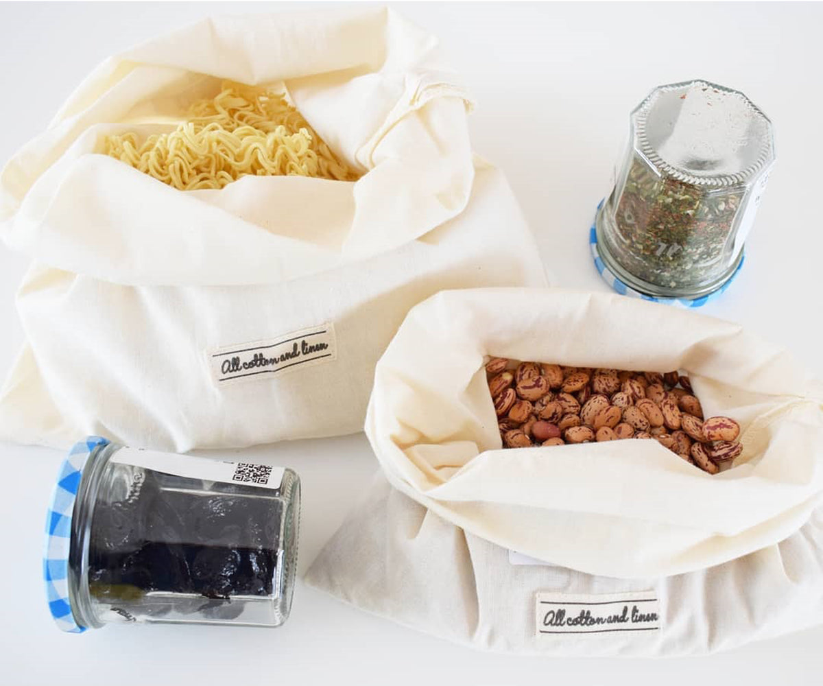 Eco-friendly muslin cloth bags crafted from breathable cotton fabric, perfect for reusable storage and gift wrapping.