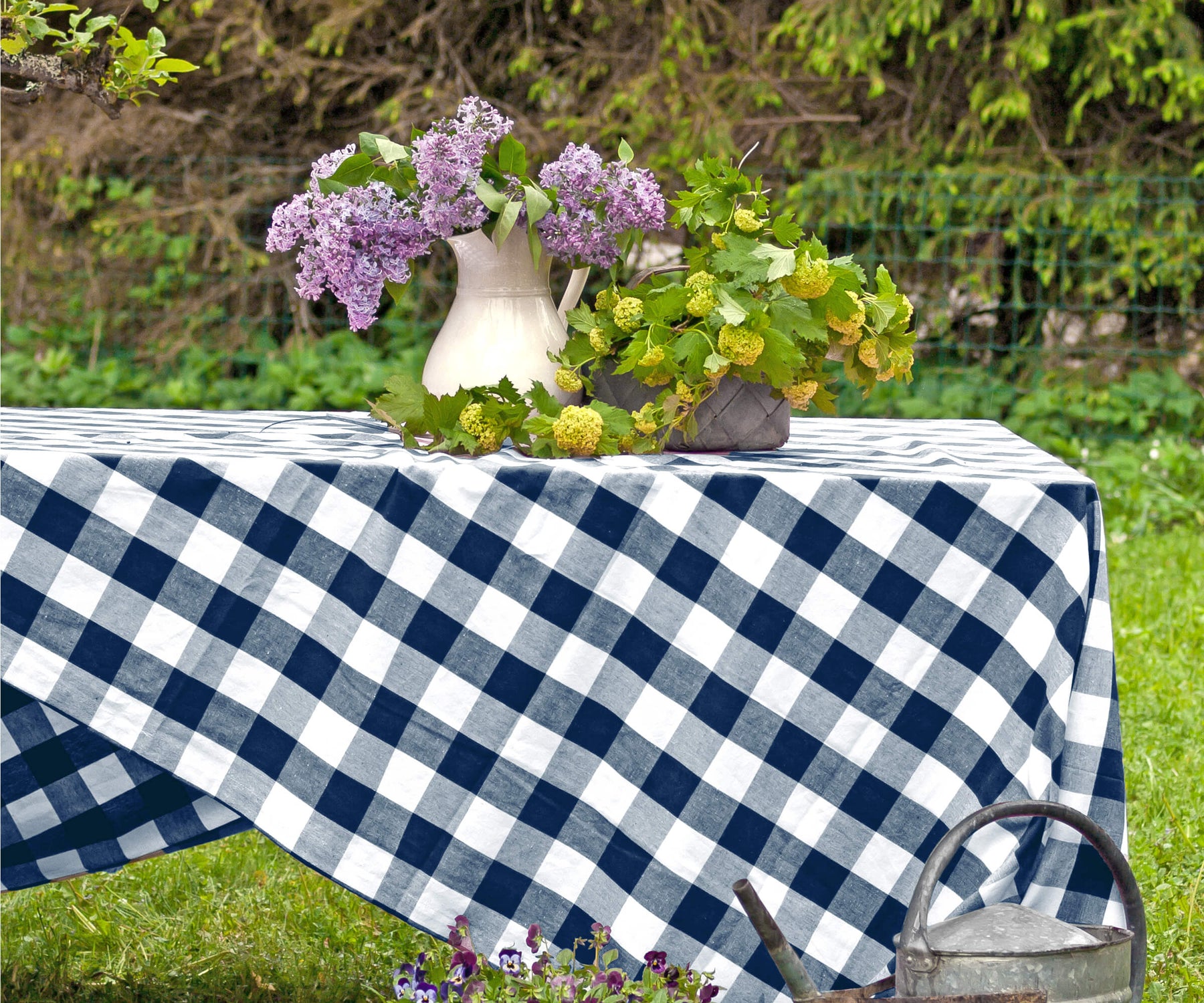 A blue and white tablecloth is often associated with nautical themes, making it ideal for beachside parties or summer gatherings.