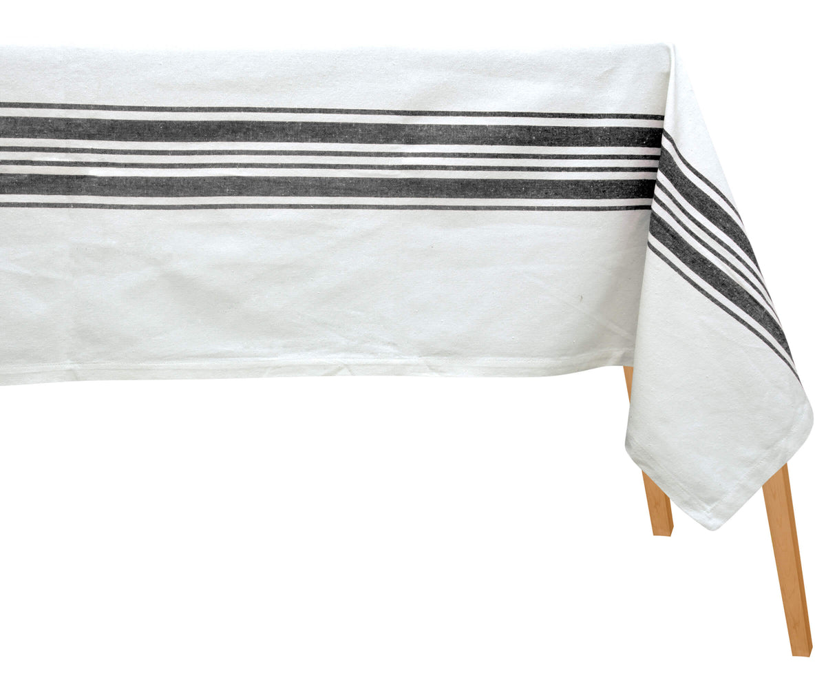 Black and white striped farmhouse tablecloth on a table