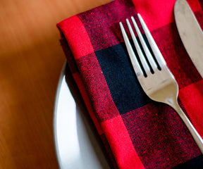 Enrich your table setting with vibrant red and white napkins, infusing charm and color into every meal.