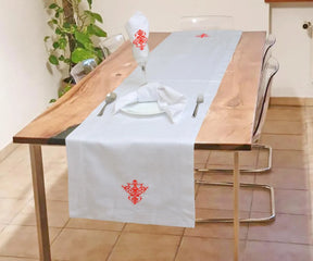 The white embroidered table runner can be used for everyday meals. red table runner for parties, farmhouse runner.