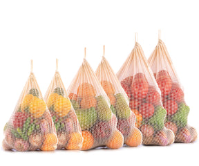 Variety of produce packed in several reusable mesh produce bags