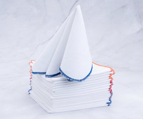 Kids cloth napkins, Find an assortment of napkins: white, blue and white, white and gold, black and white cloth, and white cotton napkins in bulk.