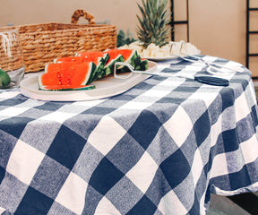 Enhance your outdoor dining ambiance with a touch of style and versatility using blue, round, and outdoor tablecloths for a refreshing experience.
