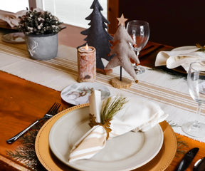 Table setting featuring one of the six blue and white striped bistro napkins