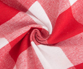 Elevate your table settings with a touch of charm and style using white, red, and buffalo plaid tablecloths, perfect for various occasions.