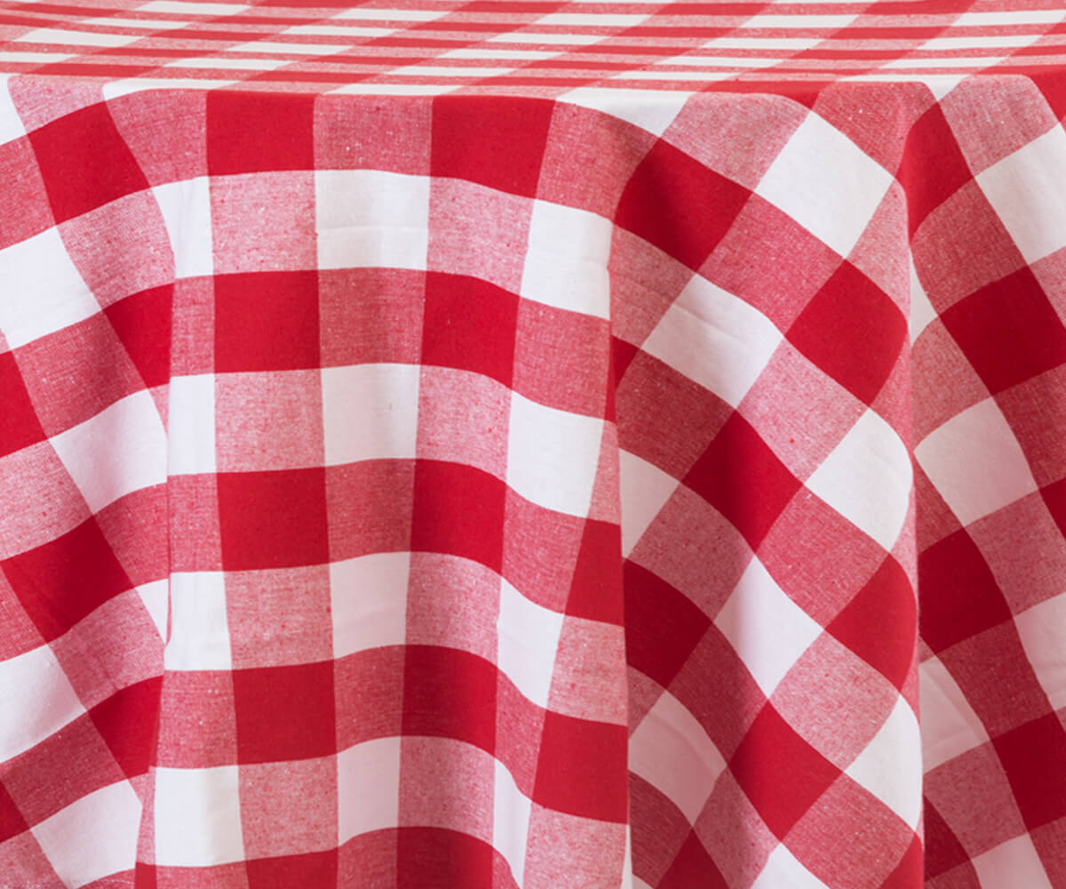 Create charming and versatile table settings with white, red, and buffalo plaid tablecloths, perfect for any occasion and style.