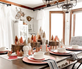 Dining table adorned with white plates and restaurant napkins in a bistro style