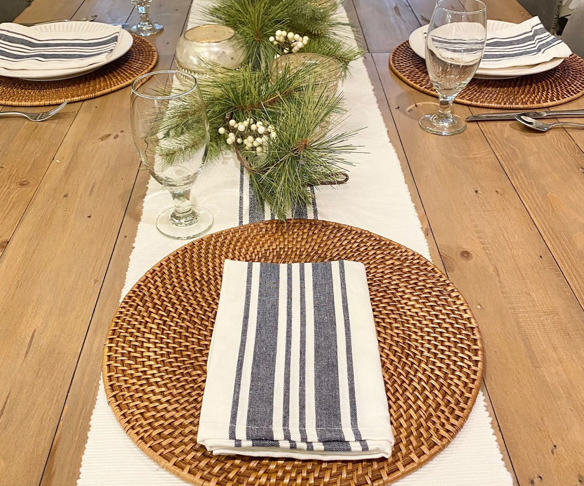 Bistro Striped napkins-White Cloth Napkins with Navy blue napkins cloth are arranged on the dining table with table runners and placemats.