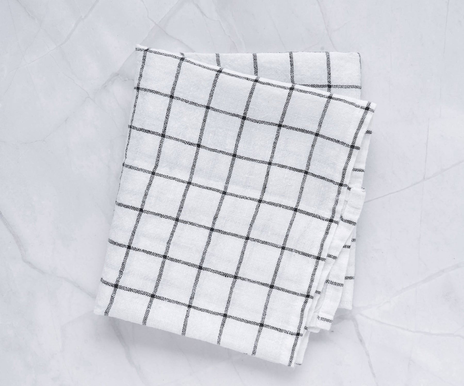 https://www.allcottonandlinen.com/cdn/shop/products/white-black-checked-towels-3_1800x.jpg?v=1690526306