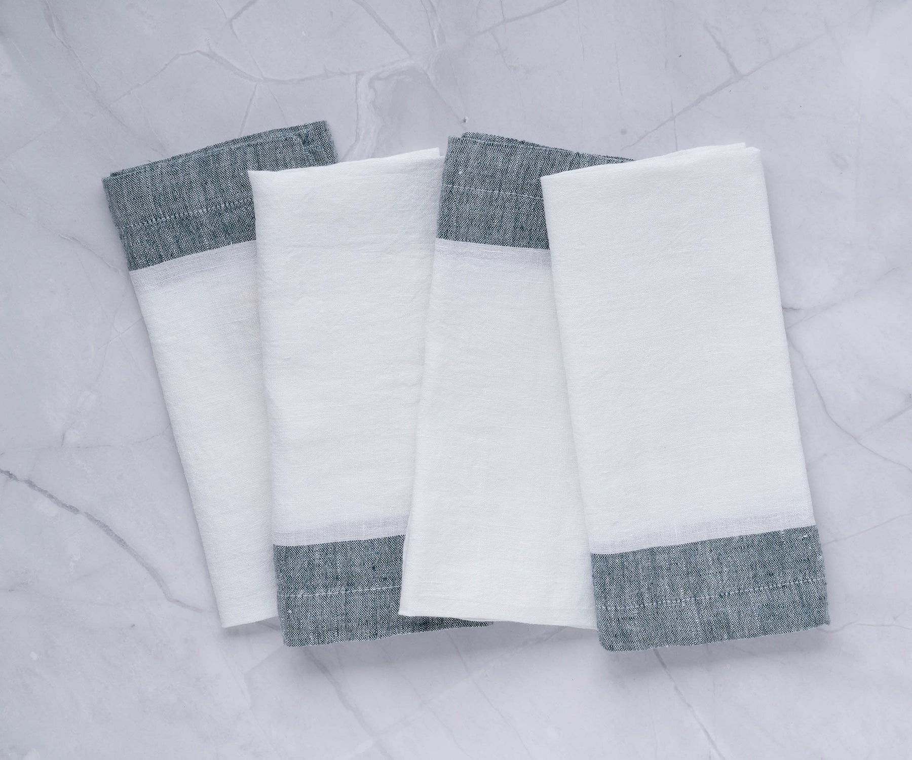 Linen-like napkins, offering the look and feel of linen with the convenience of disposable napkins.